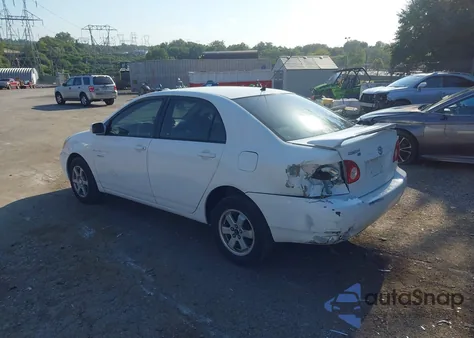 2004 Toyota Corolla Le z USA, uszkodzony, nr VIN JTDBR32EX42044932